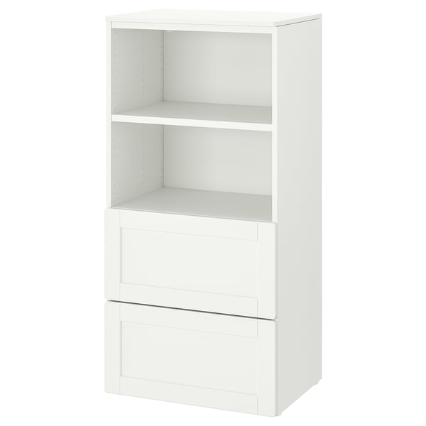 A white SMÅSTAD bookcase with drawers. It has a sleek, modern design, combining open shelves and concealed storage.