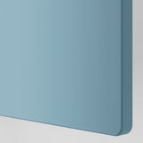 Smooth, powder-blue surface; sleek, modern design.