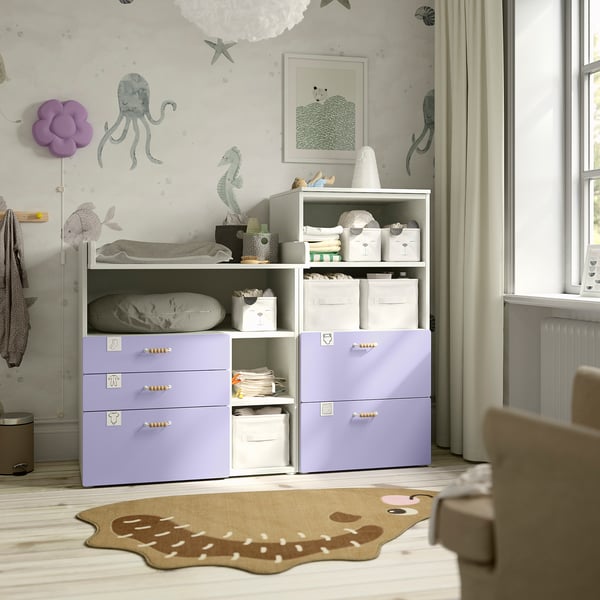 Kids room with lavender SMÅSTAD storage, rug, & baby essentials