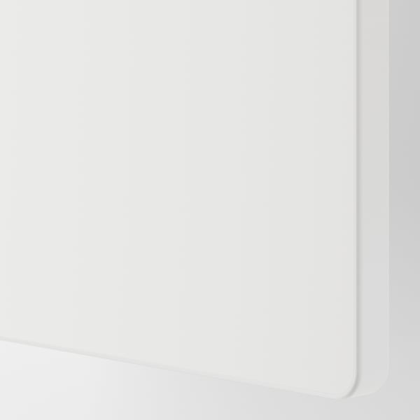 White wardrobe with soft-close doors, hanging space, shelves, and drawers. Designed for children with adjustable.