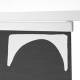 White top hem of a black and white leaf-patterned panel curtain. Ideal for light control and privacy.