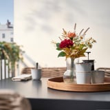 SMYCKA bouquet in vase on tray by window; red & white flowers, greenery; includes cups.