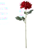 Red plastic artificial flower with green leaves.