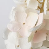 Vibrant, realistic white flowers crafted from recycled materials, showcasing high-quality design and durability.