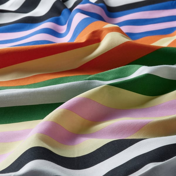 Close-up of vibrant, multicolored striped fabric, smooth and wrinkle-resistant, showcasing quality cotton/viscose blend.