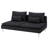 Modern dark grey l-shaped sofa with four cushions on metal legs.