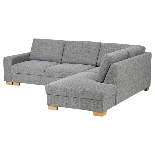 A modern, gray, l-shaped SÖRVALLEN sectional sofa with wooden legs, designed in a minimalist scandinavian style.