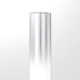 Sleek, cylindrical glass lamp, exuding modern elegance and simple design.