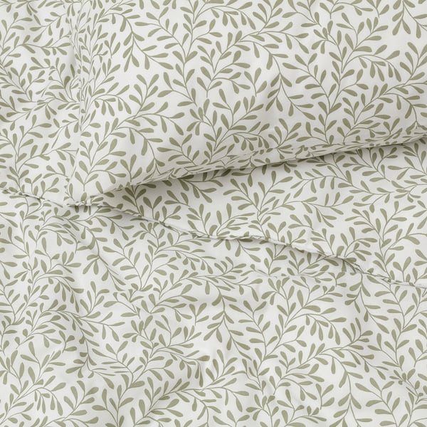 Leaf-patterned bedding, crease-free, breathable, recycled polyester, eco-friendly design.