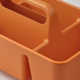 Bright orange plastic storage organizer with rounded edges and multiple compartments. Sturdy handle for easy portability.
