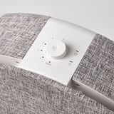 STARKVIND air purifier control panel with dial settings 1-5 and auto mode. Sleek fabric-like exterior.