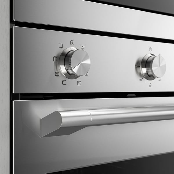 Stainless steel oven controls, sleek design, two knobs, handle, clean look.