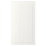 A white, rectangular STENSUND cabinet door with grooved panels and a smooth, lacquered finish.