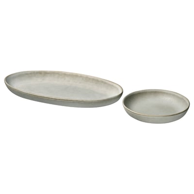 Set of rustic grey stoneware plates - oval and round shapes with matte finish.