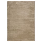 A beige STOENSE rug. Its rectangular, soft, with a slightly shiny surface. Ideal for large or small rooms, it dampens sound and feels cozy.
