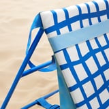 Blue & white beach chair, durable, sturdy.