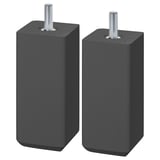 Two STUBBARP legs in dark grey. These are square, wooden furniture legs with adjustable screws for leveling. They have a sleek, minimalist design.