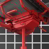 Red STYRSPEL gaming chairs base and gas cylinder, black mesh back.