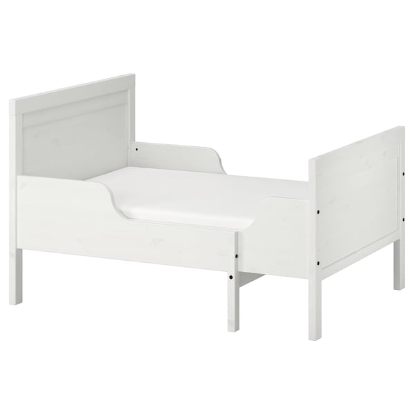 A white SUNDVIK toddler bed, made of pine and fiberboard, with a simple, rectangular design.