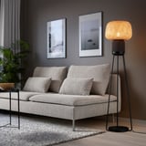 SYMFONISK wi-fi speaker floor lamp next to sofa, art, plant.