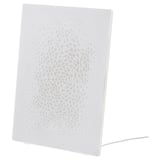 White SYMFONISK speaker, blend of picture frame and wifi speaker, sleek rectangular design.