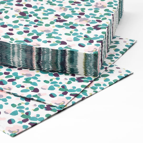 Stacked, colorful, patterned paper napkins with abstract shapes. Three-ply design ensures high absorbency. Bright and inviting for table settings.