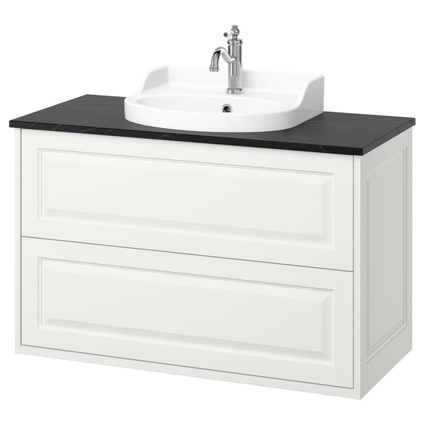The TÄNNFORSEN vanity in white wood with a black countertop and a single bowl sink with chrome faucet.
