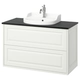 The TÄNNFORSEN vanity in white wood with a black countertop and a single bowl sink with chrome faucet.