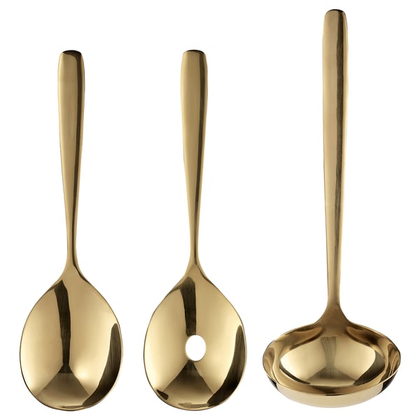 Three brass-colored TILLAGD utensils: a spoon, a ladle, and a serving spoon, each made of stainless steel with a sleek and elegant design.