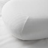 Close-up of soft, white pillowcase with stretchy edges, showcasing quality cotton-blend fabric.