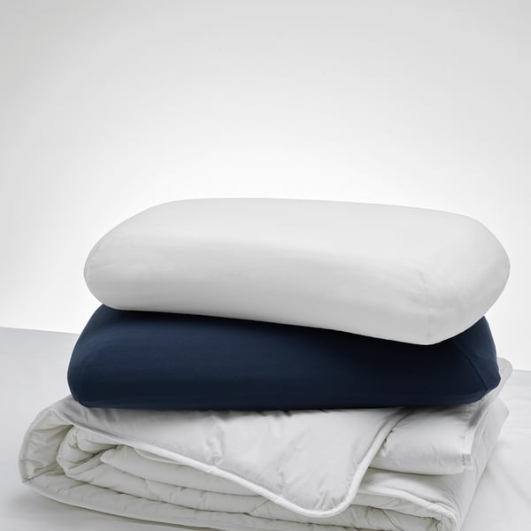 TÖCKENFLY pillowcases - white & navy with elastic edges. White is larger.