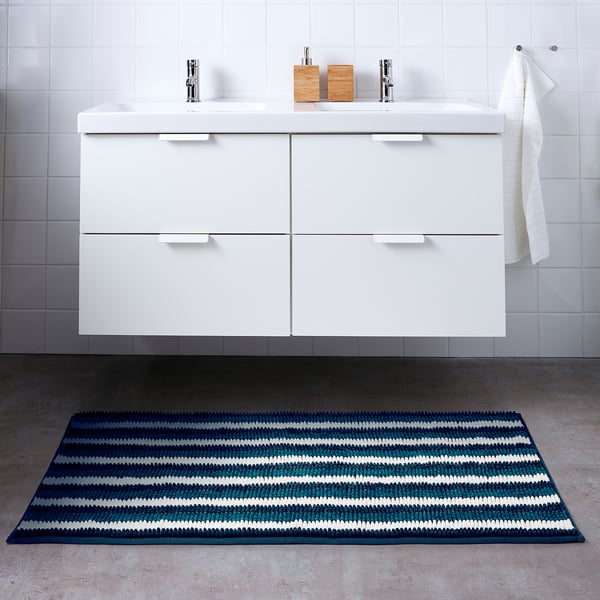 Floating vanity with TOFTBO striped mat, quick-dry & recycled.