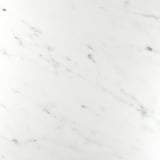 Tolkien countertop close-up, pristine white with subtle grey veining, smooth texture.