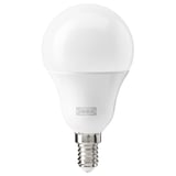 A white smart led bulb by ikea, shaped like a classic lightbulb with a smooth, rounded cover made of polycarbonate plastic.