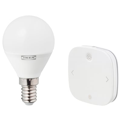 Led bulb & remote by ikea. White, round bulb with e14 base; white, rectangular remote with light/dim controls.