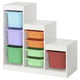 An IKEA TROFAST childrens storage unit in white with colorful plastic containers.