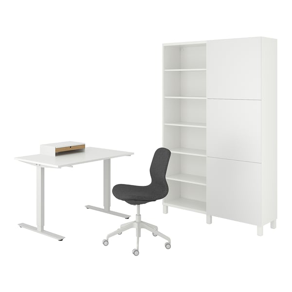 Home office setup: white sit-stand desk, grey chair, white storage unit.