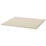 A TROTTEN table top in beige, made of melamine and particleboard.