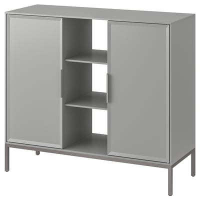 A modern, gray TULLSTORP metal sideboard with sleek, beveled doors and open shelves for storage.