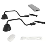 A TVÄRDRAG lamp kit with black lamp heads, flexible arms, and a grey power supply, plus a white remote for wired control.