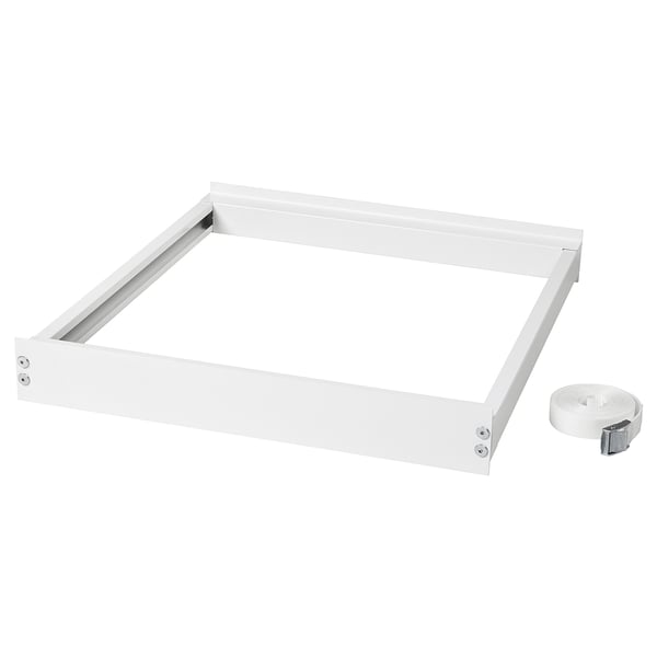 White TYKARP appliance stacking kit with metal frame and straps.