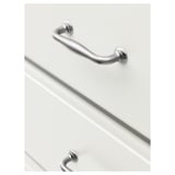 A sleek, modern drawer handle in polished chrome, showcasing smooth curves and high-quality craftsmanship.