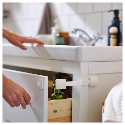 UNDVIKA white child safety latches, straight band design with four rectangular clips.