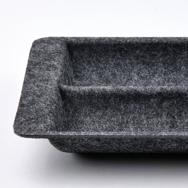 Small gray rectangular organizer with textured surface.