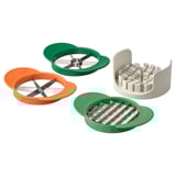 Four-colored fruit cutters: orange, green, white. Slicing, wedges, stripes. Colored steel blades, plastic bases.