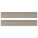 Two beige rectangular boxes with sleek edges and integrated handles, placed horizontally.