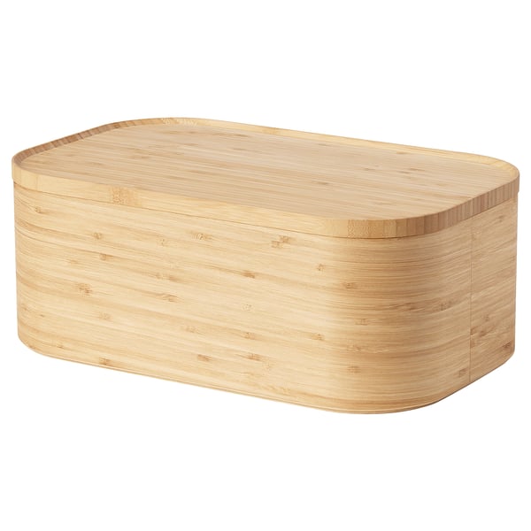 Wooden box UPPSKATTNING stores bread, lid as cutting board and serving tray. Rectangular, rounded corners, elegant.