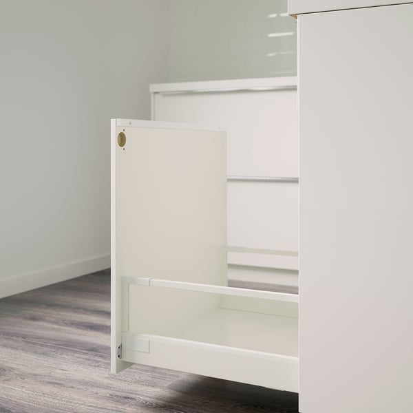 White cabinet with open drawer, showing interior compartments. Suitable for small kitchen spaces.