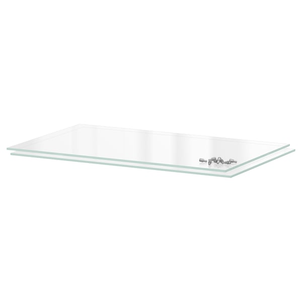 A UTRUSTA glass shelf in clear, rectangular shape. Its made of tempered glass, ideal for organizing kitchen items.
