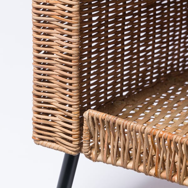 Woven rattan cat house, beautifully crafted with natural, sturdy material and dark legs, offering cozy comfort for pets.